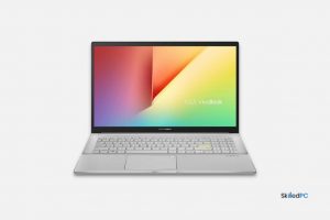 Asus vivoBook with white keyboard.