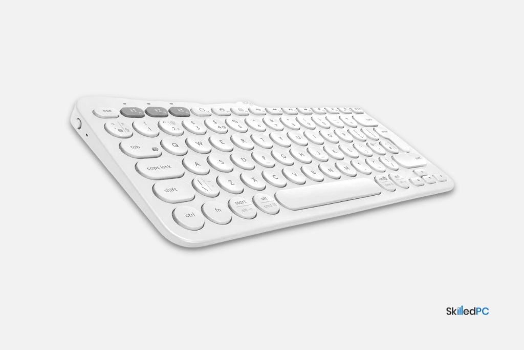 Logitech K380 rounded button keyboard for long nails.