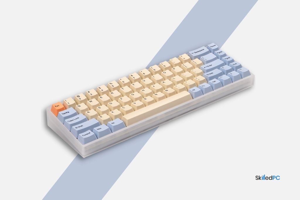 A Tofu 65 keyboard with Cream and Baby Blue buttons.