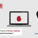 A thief is trying to steal the laptop.