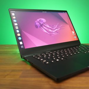 14 -inch Black Razer Blade Laptop placed on a table.